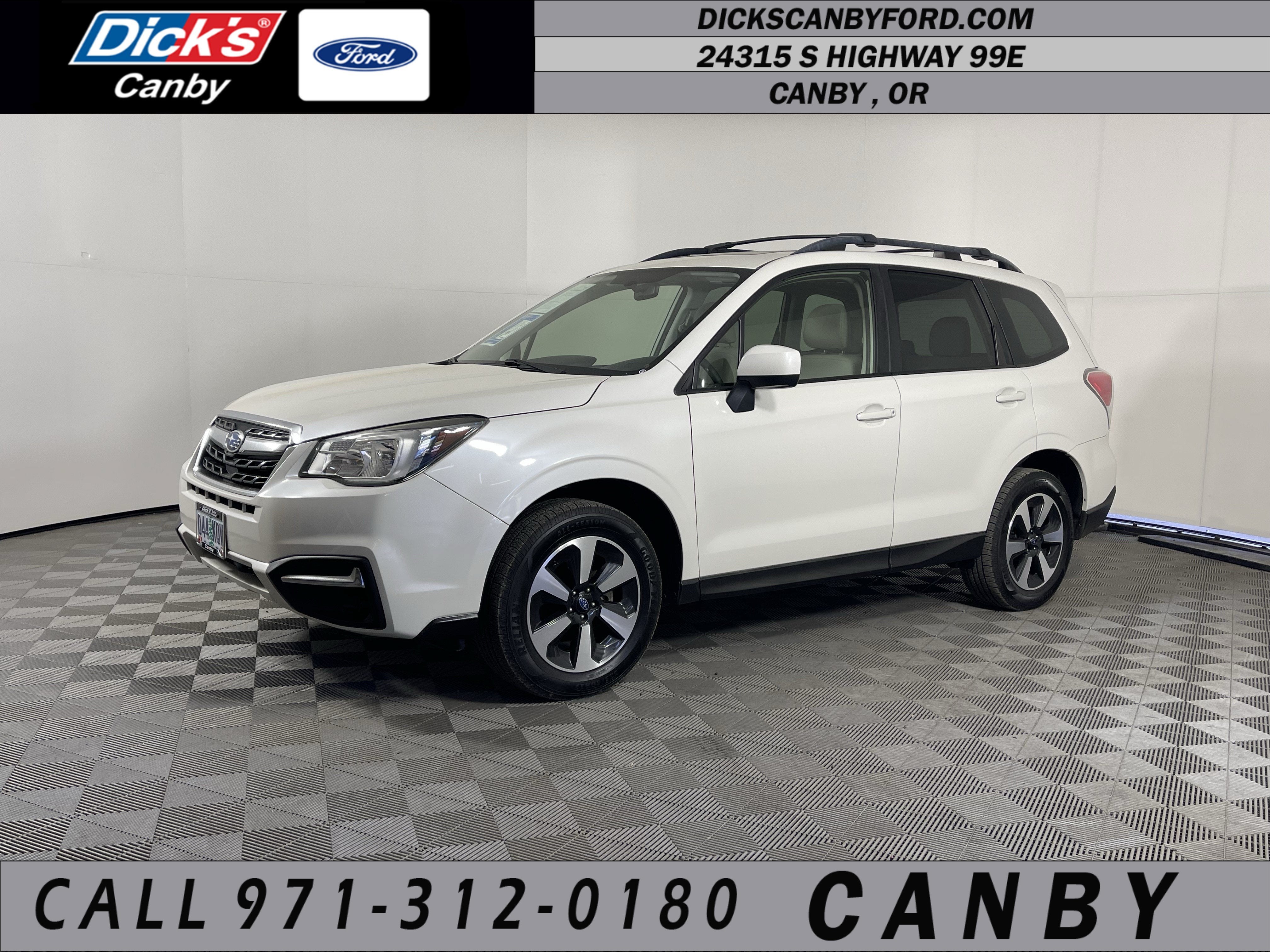 2017 Subaru Forester Premium in Crystal White Pearl — front three-quarter view