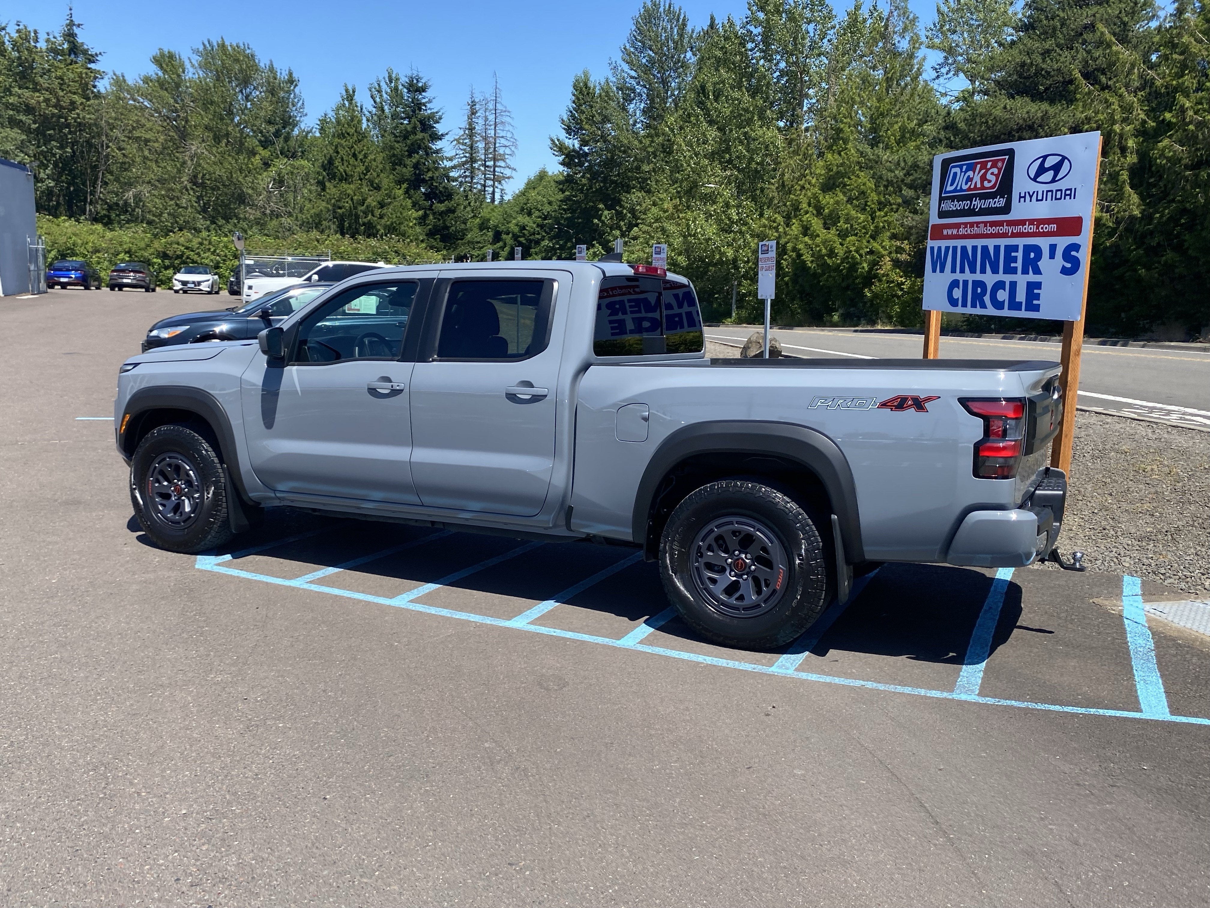 2025 Nissan Frontier — rear three-quarter view