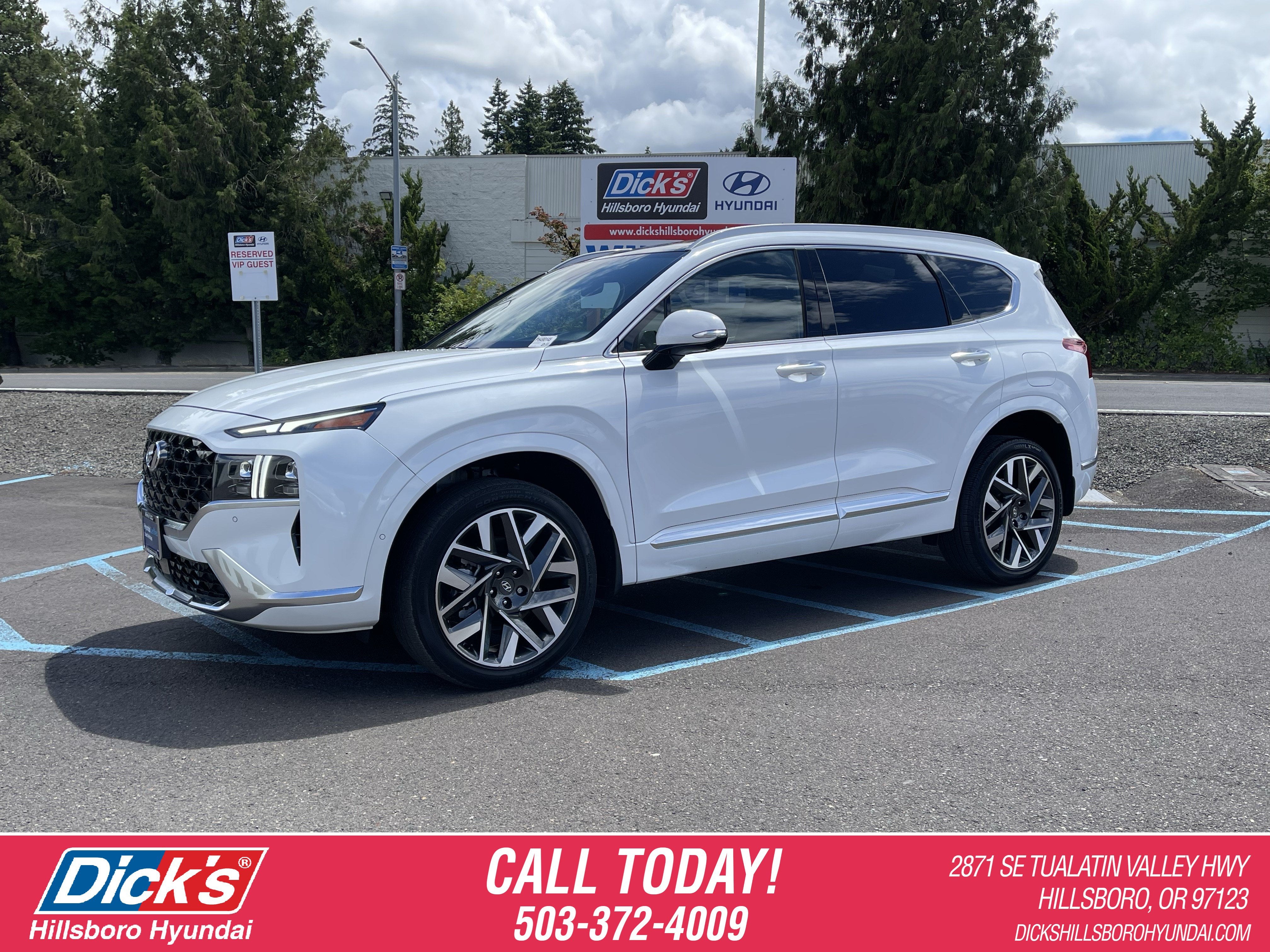 2023 Hyundai SANTA FE Calligraphy in Quartz White — front three-quarter view