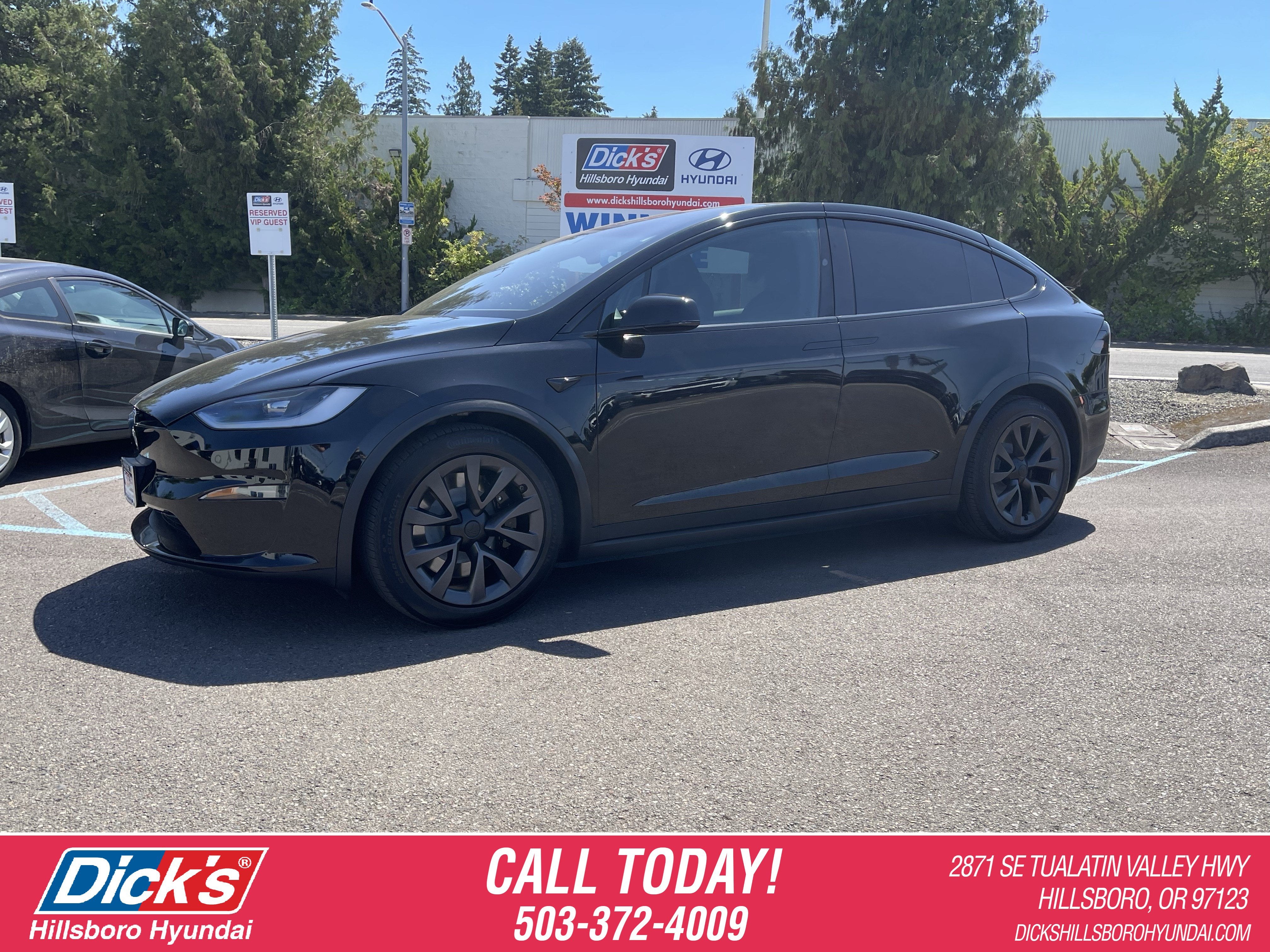 2023 Tesla Model X AWD in Other — front three-quarter view