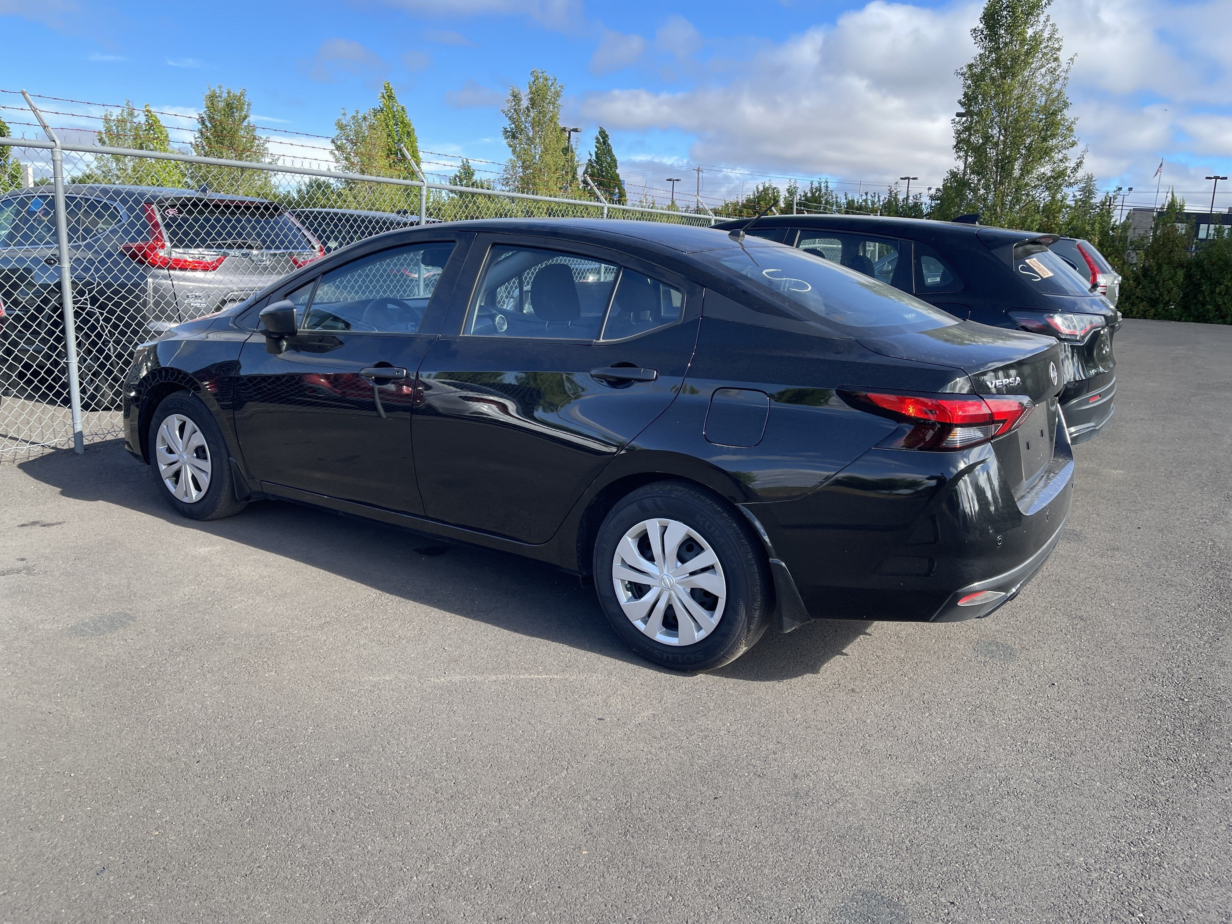2025 Nissan Versa — rear three-quarter view