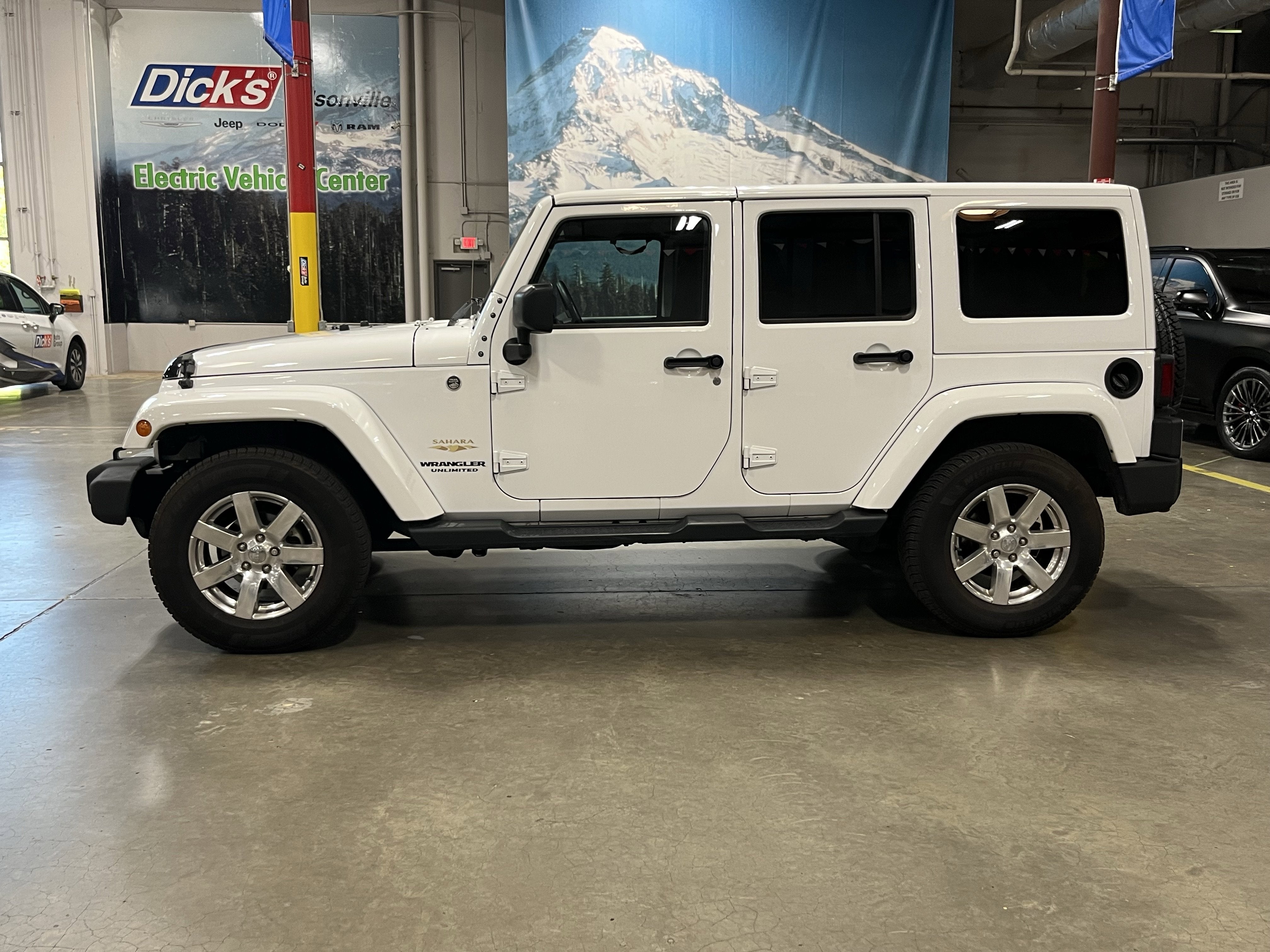 2015 Jeep Wrangler — rear three-quarter view