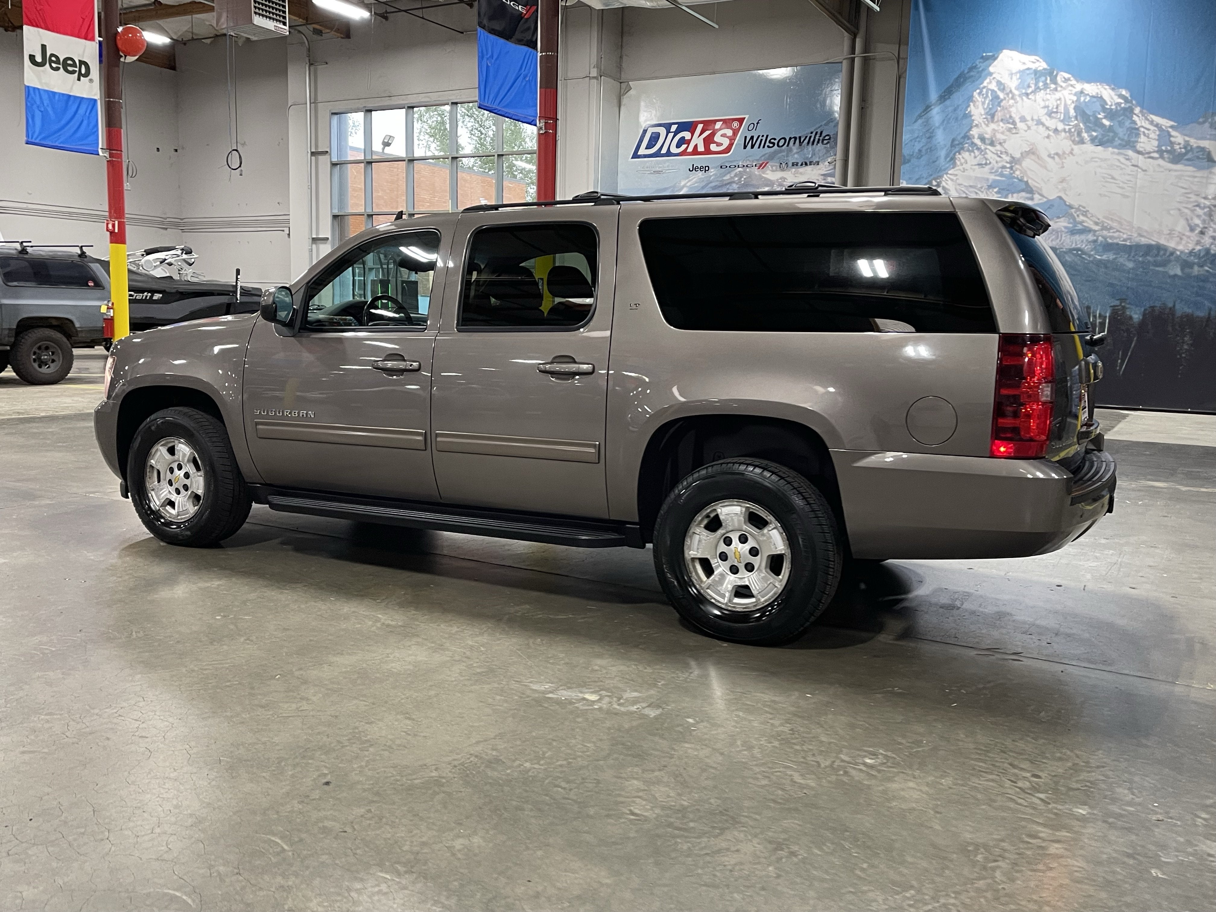2011 Chevrolet Suburban 1500 — rear three-quarter view