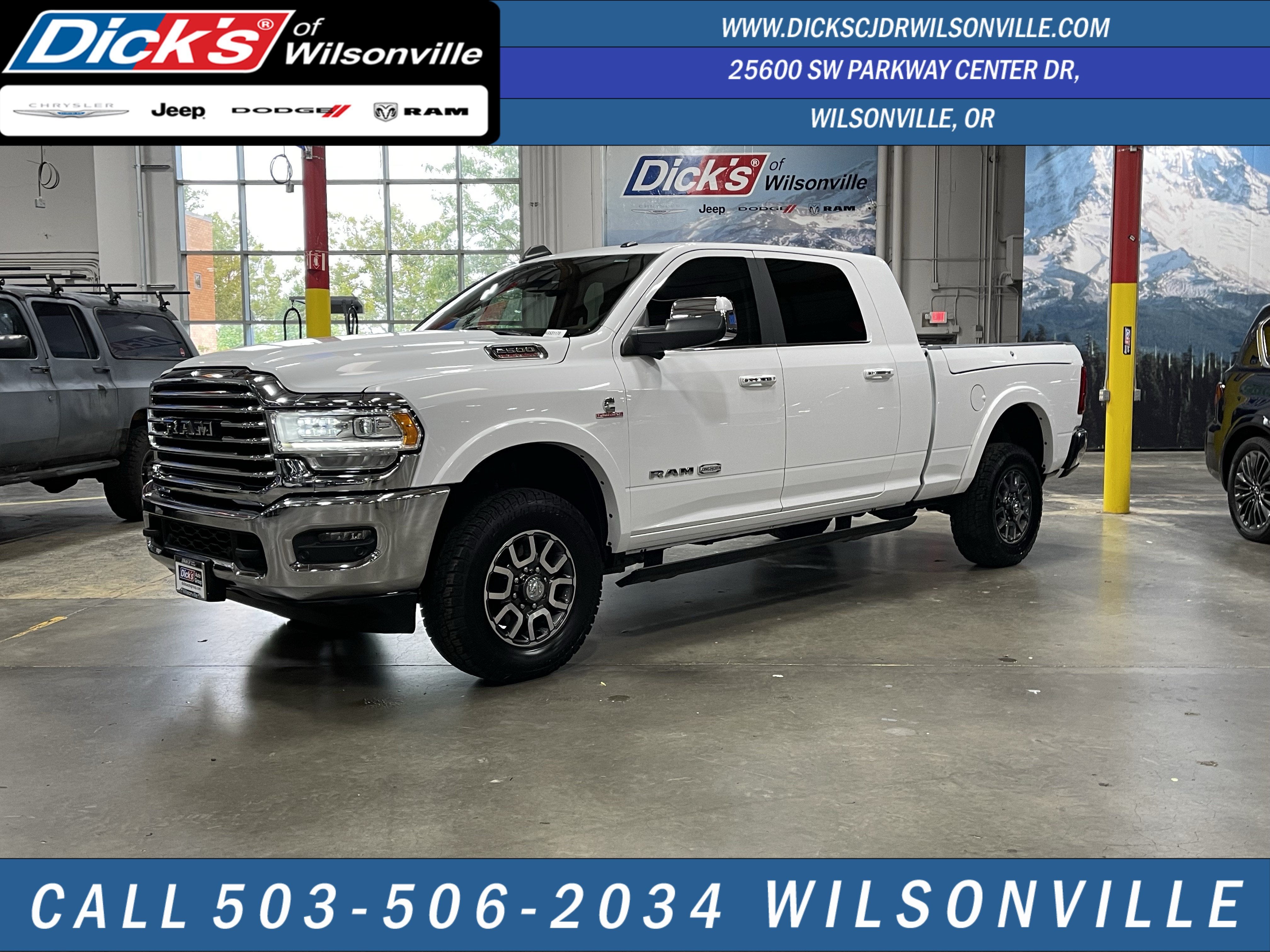2019 RAM 2500 Laramie Longhorn in Bright White Clearcoat — front three-quarter view